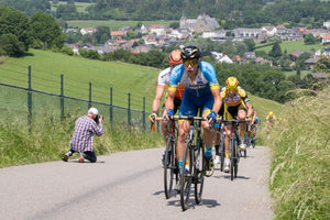 cyclists riding uphill